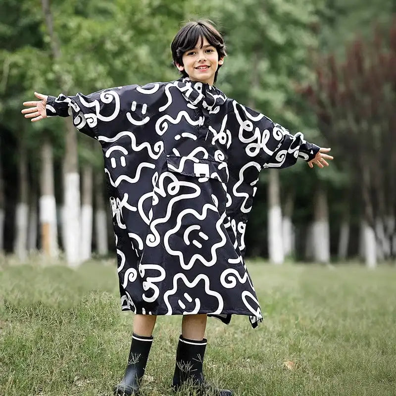 Kinder Regenponcho schwarz weiss 10 Jahre