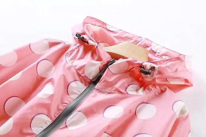 Regenponcho rosa gepunktet, große Kreise, Kapuze Kordelzug, Reißverschluss