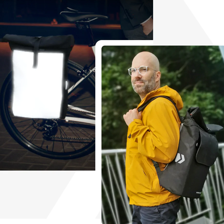 Fahrrad mit vollreflektierende Fahrradtasche Rucksack am Gepäckträger und ein Mann trägt einen schwarzen Rucksack mit Klappe