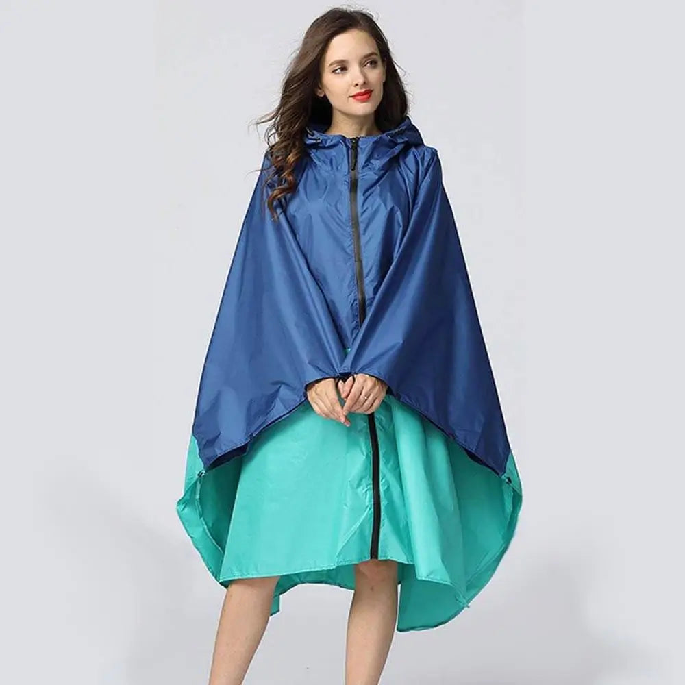Regencape Damen blau turkis ohne armel mit reißverschluss vorne wasserdicht zweifarbig