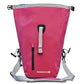 Pinke refurbished Gepäckträgertasche von vorne dargestellt und offenen Rolltop und seitliche Gurte. Tasche besitzt kleine Vordertasche mit Reisverschluss.